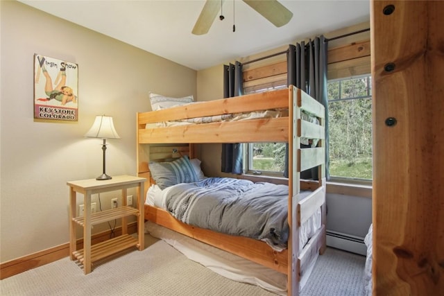 188 Tip Top Trl Unit 6558, Dillon, CO 80435 - bedroom featuring a baseboard heating unit, multiple windows, and a ceiling fan