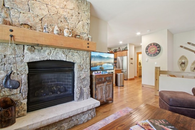 188 Tip Top Trl Unit 6558, Dillon, CO 80435 - living room with light wood-type flooring, a fireplace, and recessed lighting