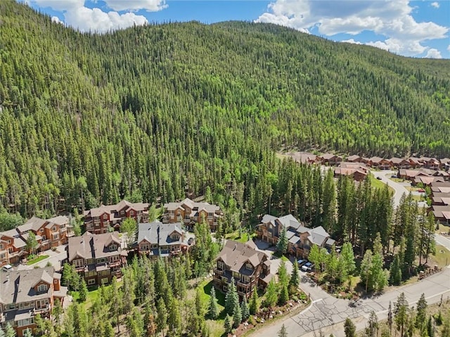 188 Tip Top Trl Unit 6558, Dillon, CO 80435 - aerial perspective of suburban area with a heavily wooded area and a mountainous background