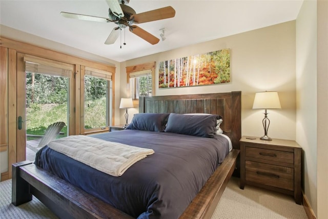 188 Tip Top Trl Unit 6558, Dillon, CO 80435 - bedroom featuring access to outside, light carpet, and ceiling fan