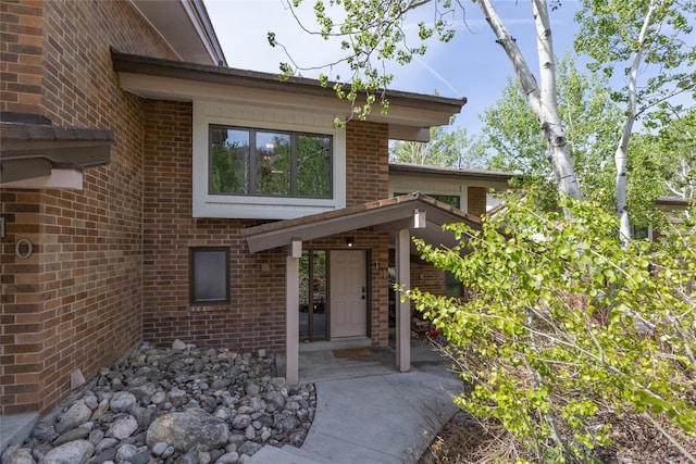 2735 Burgess Creek Rd Unit 11, Steamboat Springs, CO 80487 - view of exterior entry with brick siding