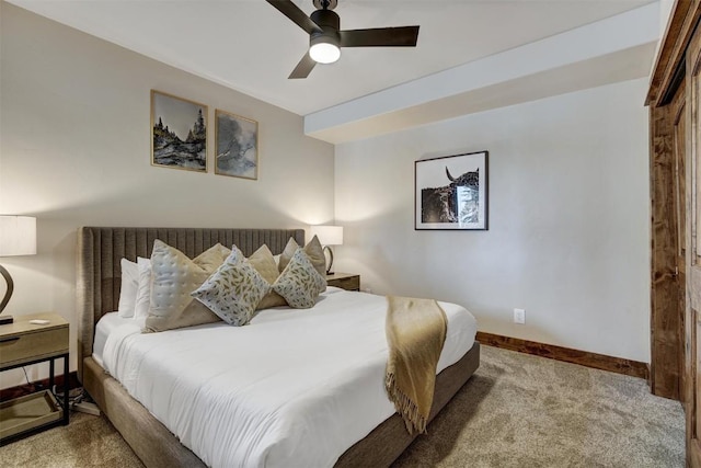 bedroom featuring carpet floors, baseboards, and a ceiling fan