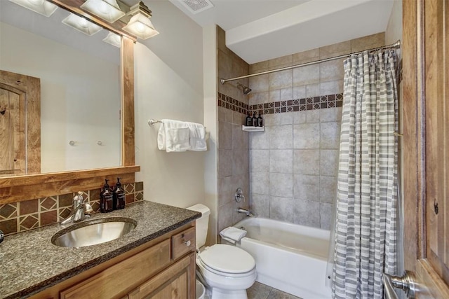 full bathroom featuring visible vents, toilet, shower / bath combo with shower curtain, vanity, and backsplash