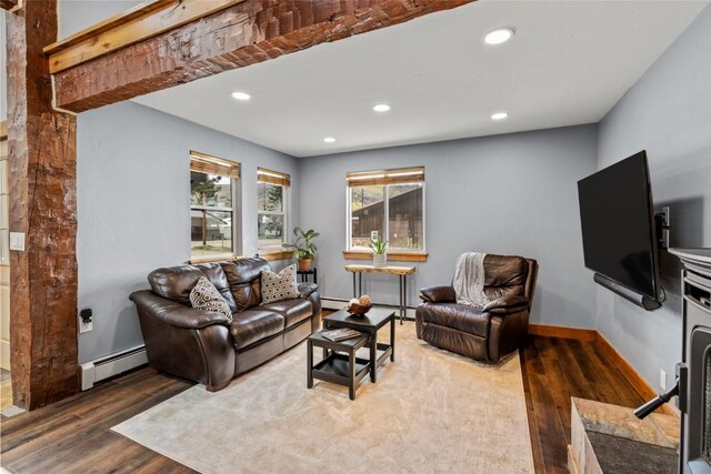 77 Lincoln St, Yampa, CO 80483 - living area featuring wood finished floors, a baseboard heating unit, baseboards, recessed lighting, and a baseboard radiator