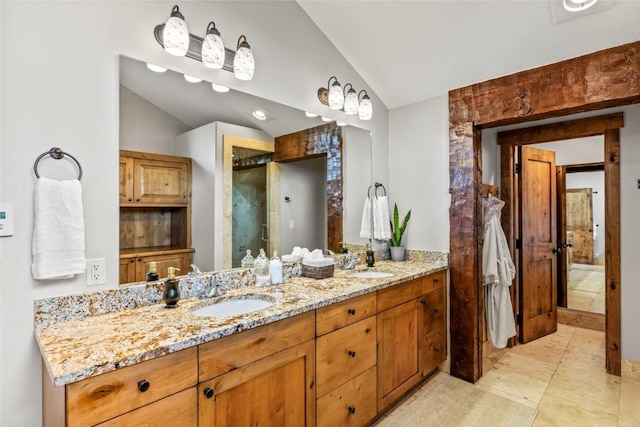 77 Lincoln St, Yampa, CO 80483 - full bathroom with lofted ceiling, double vanity, and an enclosed shower