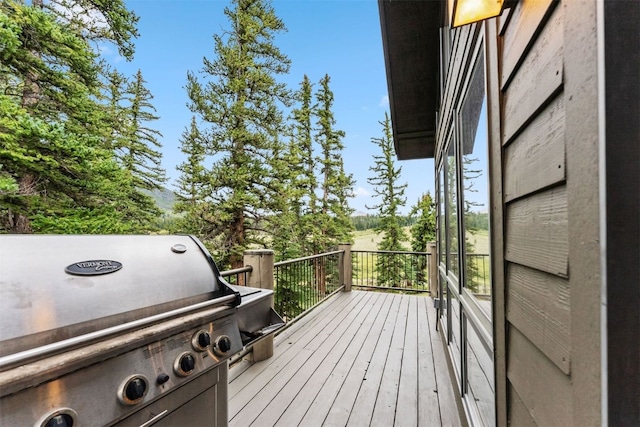 1118 Penstemon Rd, Dillon, CO 80435 - wooden deck featuring a grill