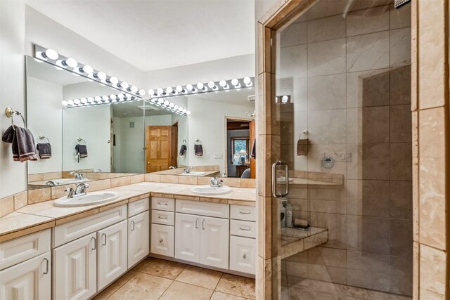 1118 Penstemon Rd, Dillon, CO 80435 - ensuite bathroom with a shower stall, double vanity, and tile patterned floors