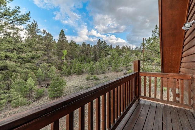 664 Tonkawa Rd, Hartsel, CO 80449 - wooden terrace featuring a view of trees