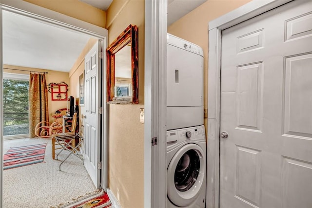664 Tonkawa Rd, Hartsel, CO 80449 - laundry room featuring estacked washer and dryer and carpet