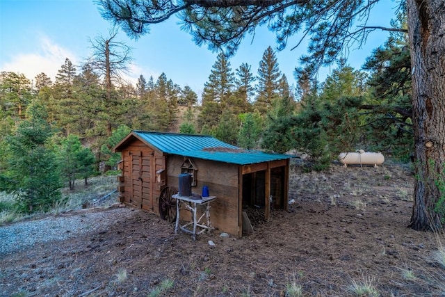 664 Tonkawa Rd, Hartsel, CO 80449 - view of outdoor structure featuring a wooded view