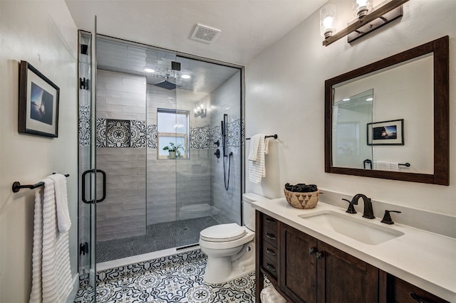 7 Lookout Ridge Dr Unit 7, Dillon, CO 80435 - bathroom with toilet, vanity, a shower stall, and tile patterned flooring