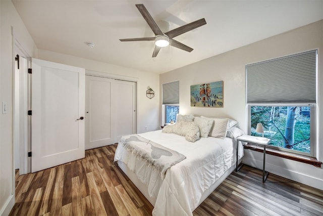 7 Lookout Ridge Dr Unit 7, Dillon, CO 80435 - bedroom featuring wood finished floors, a closet, a ceiling fan, and baseboards