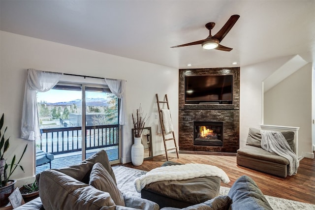 7 Lookout Ridge Dr Unit 7, Dillon, CO 80435 - living area featuring a ceiling fan, a large fireplace, wood finished floors, baseboards, and recessed lighting