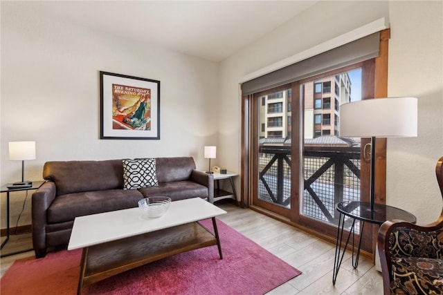 505A S Main St Unit 1204, Breckenridge, CO 80424 - living area featuring light wood-style flooring