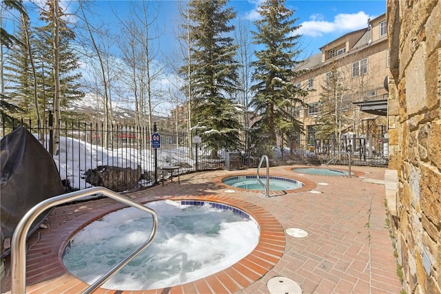 505A S Main St Unit 1204, Breckenridge, CO 80424 - view of swimming pool featuring fence and a hot tub