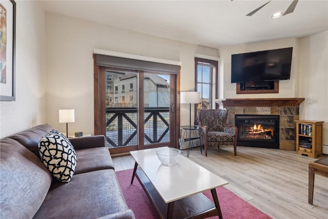 505A S Main St Unit 1204, Breckenridge, CO 80424 - living area featuring recessed lighting, ceiling fan, wood finished floors, and a fireplace
