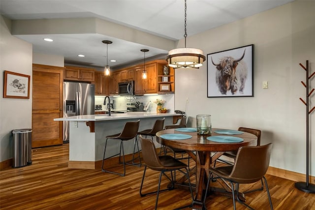 1463 Flattop Cir Unit 204, Steamboat Springs, CO 80487 - dining space with baseboards, recessed lighting, and dark wood-style flooring