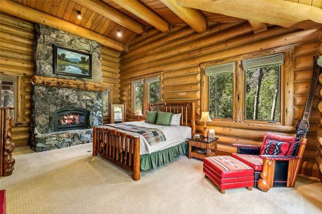 33225 Painted Pony Ln, Steamboat Springs, CO 80487 - carpeted bedroom featuring a wooden ceiling with exposed beams, a stone fireplace, and log walls