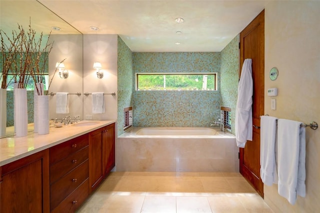 33225 Painted Pony Ln, Steamboat Springs, CO 80487 - bathroom with a garden tub, vanity, and tile patterned flooring