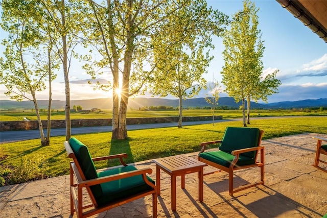 33225 Painted Pony Ln, Steamboat Springs, CO 80487 - view of patio with a water and mountain view