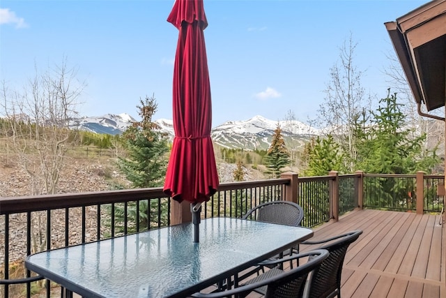 200 Rachel Ln, Breckenridge, CO 80424 - wooden deck featuring a mountain view and outdoor dining area