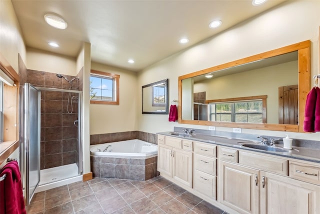 200 Rachel Ln, Breckenridge, CO 80424 - bathroom with double vanity, a bath, plenty of natural light, a shower stall, and recessed lighting