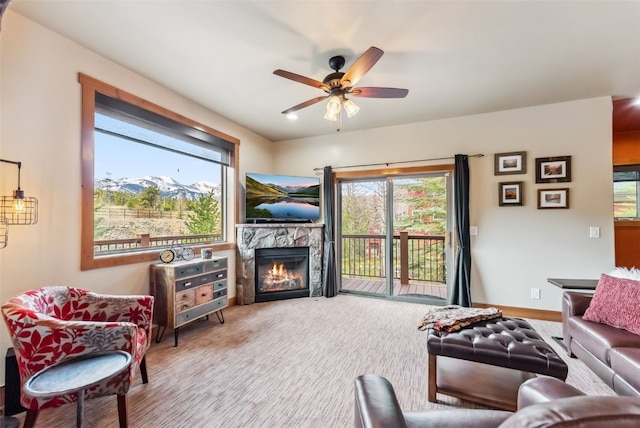 200 Rachel Ln, Breckenridge, CO 80424 - living room with ceiling fan, a fireplace, and carpet floors