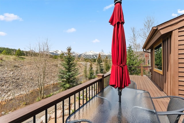 200 Rachel Ln, Breckenridge, CO 80424 - wooden terrace featuring a mountain view and outdoor dining area