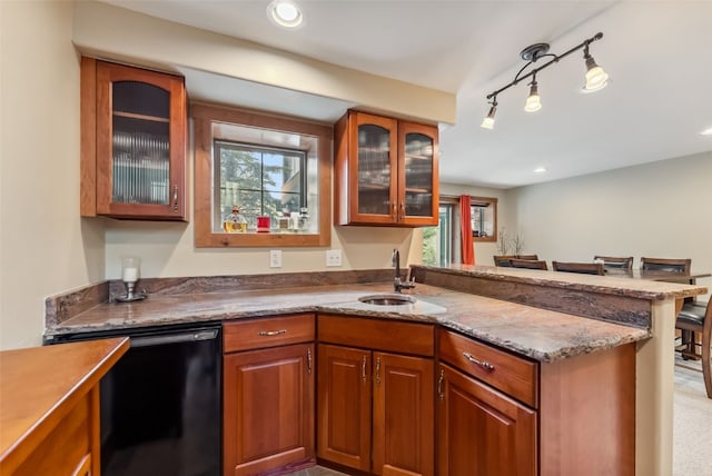 200 Rachel Ln, Breckenridge, CO 80424 - kitchen with a sink, dishwasher, brown cabinetry, a peninsula, and recessed lighting
