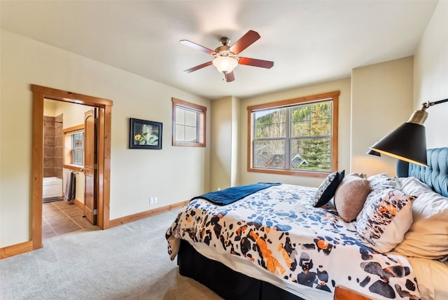 200 Rachel Ln, Breckenridge, CO 80424 - bedroom featuring baseboards, carpet flooring, tile patterned flooring, a ceiling fan, and connected bathroom