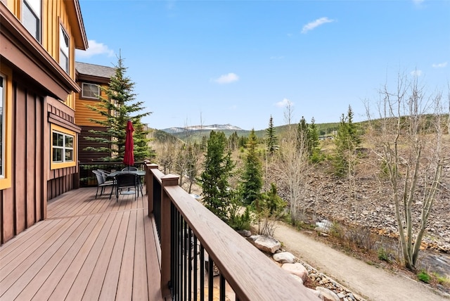 200 Rachel Ln, Breckenridge, CO 80424 - deck with outdoor dining area and a mountain view