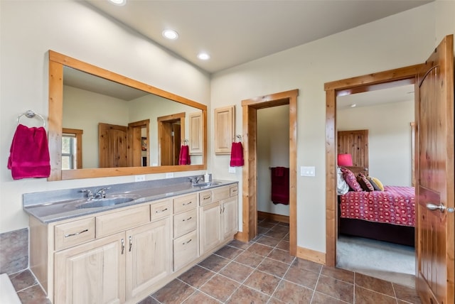 200 Rachel Ln, Breckenridge, CO 80424 - bathroom featuring double vanity, ensuite bath, recessed lighting, tile patterned floors, and baseboards