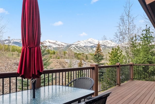 200 Rachel Ln, Breckenridge, CO 80424 - wooden deck with a mountain view and outdoor dining area