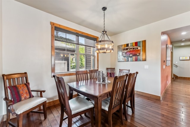 200 Rachel Ln, Breckenridge, CO 80424 - dining space with a chandelier, hardwood / wood-style floors, and baseboards