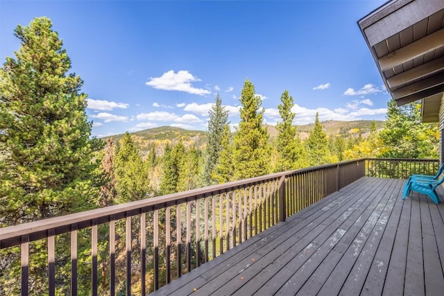 537 Moonstone Rd, Breckenridge, CO 80424 - wooden terrace with a wooded view