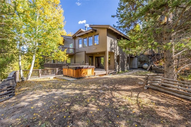 537 Moonstone Rd, Breckenridge, CO 80424 - rear view of property featuring a hot tub and a balcony