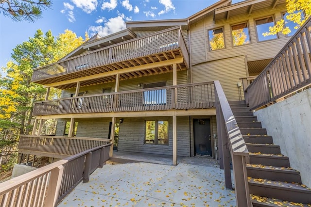 537 Moonstone Rd, Breckenridge, CO 80424 - back of property featuring stairway and a patio
