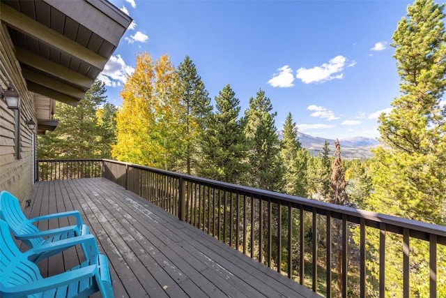 537 Moonstone Rd, Breckenridge, CO 80424 - wooden deck with a mountain view and a forest view