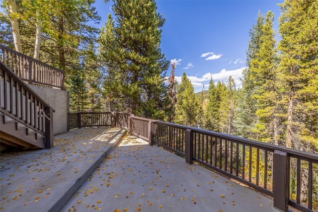 537 Moonstone Rd, Breckenridge, CO 80424 - view of patio / terrace featuring stairs and a wooded view