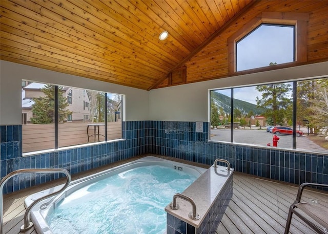 view of pool featuring a hot tub