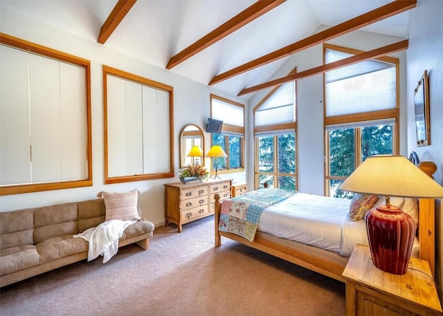bedroom with carpet flooring, beam ceiling, and high vaulted ceiling