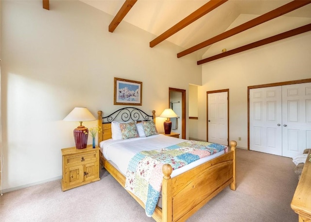bedroom featuring high vaulted ceiling, light carpet, and beam ceiling