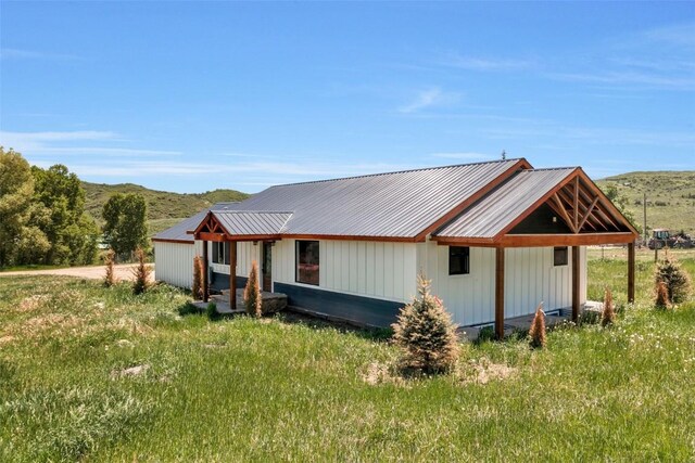 32655 County Road 179, Oak Creek, CO 80467 - view of modern farmhouse