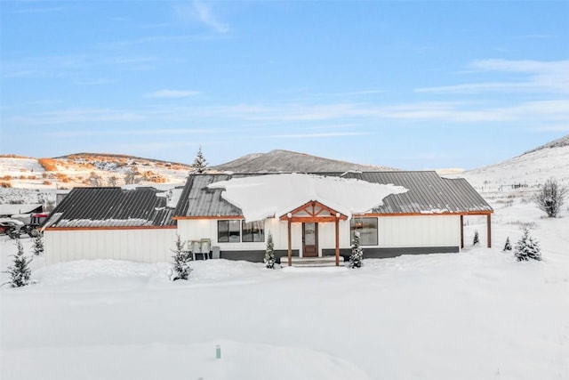32655 County Road 179, Oak Creek, CO 80467 - snow covered house with a mountain view