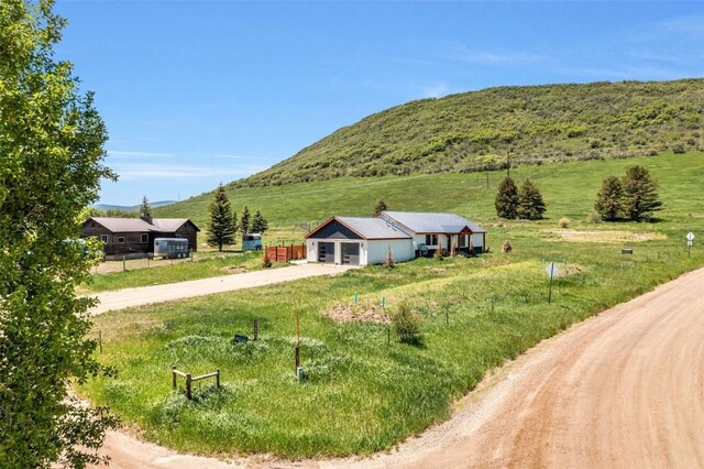 32655 County Road 179, Oak Creek, CO 80467 - finished below grade area with light wood-style floors and recessed lighting