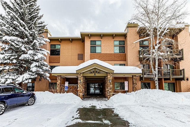 view of snow covered building