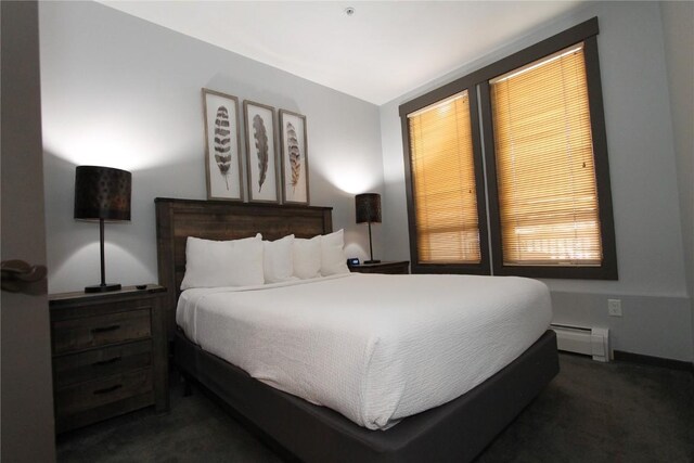 172 Copper Cir Unit 101, Copper Mountain, CO 80443 - bedroom featuring a baseboard radiator and carpet floors
