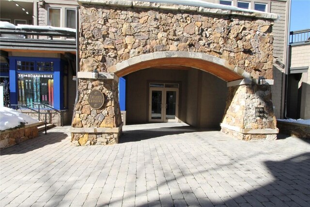 172 Copper Cir Unit 101, Copper Mountain, CO 80443 - doorway to property featuring french doors and stone siding