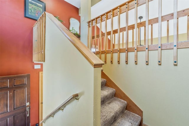 stairs with a towering ceiling