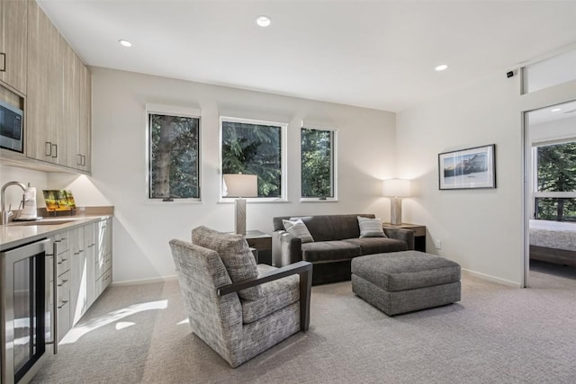405 Creekside Dr, Frisco, CO 80443 - living room with light colored carpet, beverage cooler, recessed lighting, and bar area